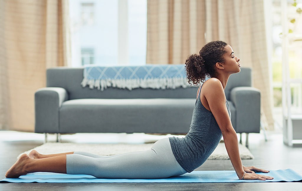 woman in yoga cobra pose