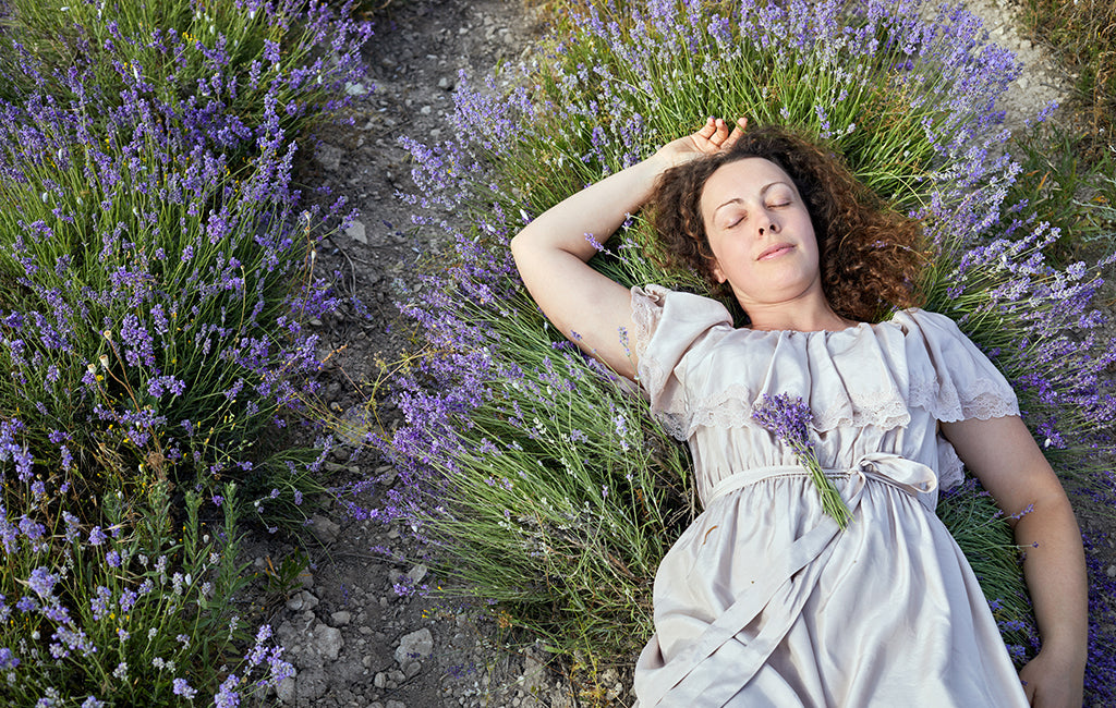 woman sleeping in lavendar field