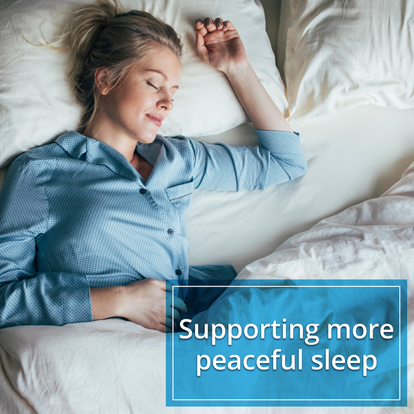Woman sleeping peacefully in bed